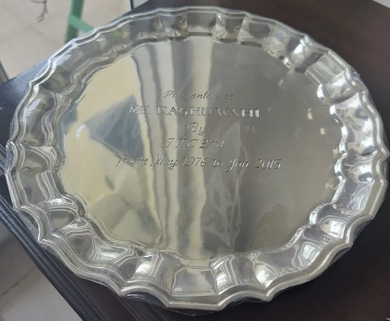 Engraved silver plate presented to Raghu Wahi by ITC