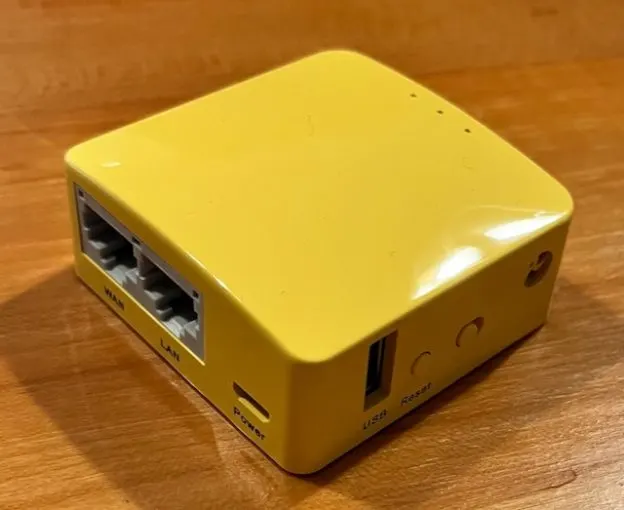 GL.iNet Mango travel router running OpenWRT for wireless people counting